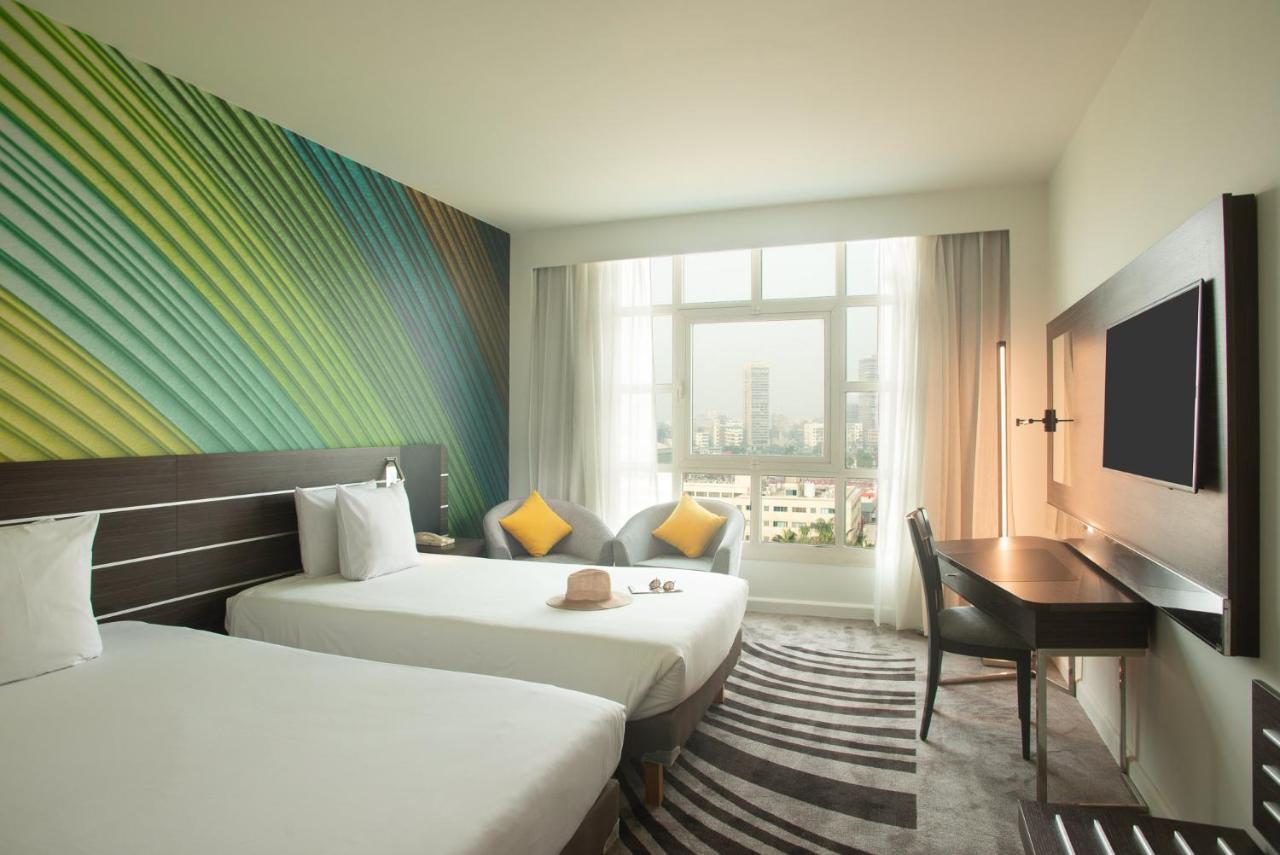 Quarto Superior com 2 Camas de Solteiro - Lado da Cidade