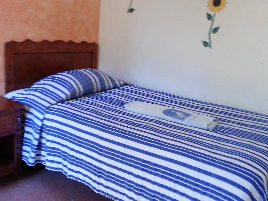 Quarto Individual com Banheiro Compartilhado