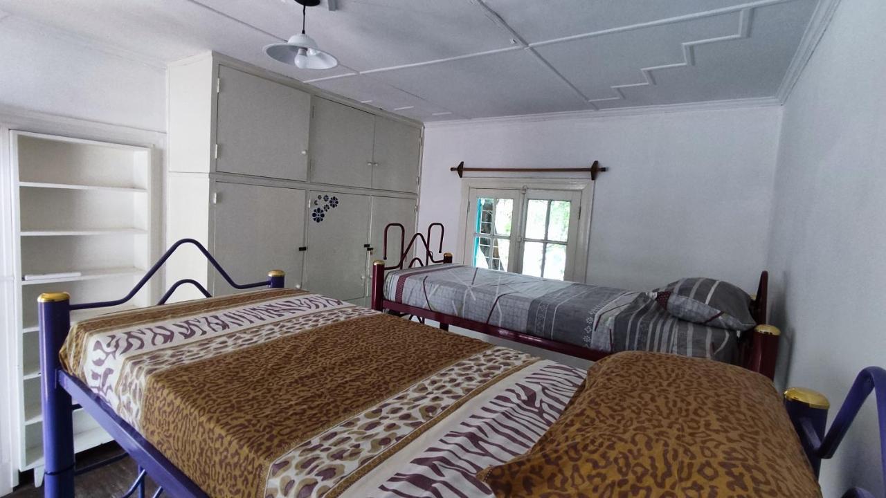 Cama en habitación compartida de 8 camas