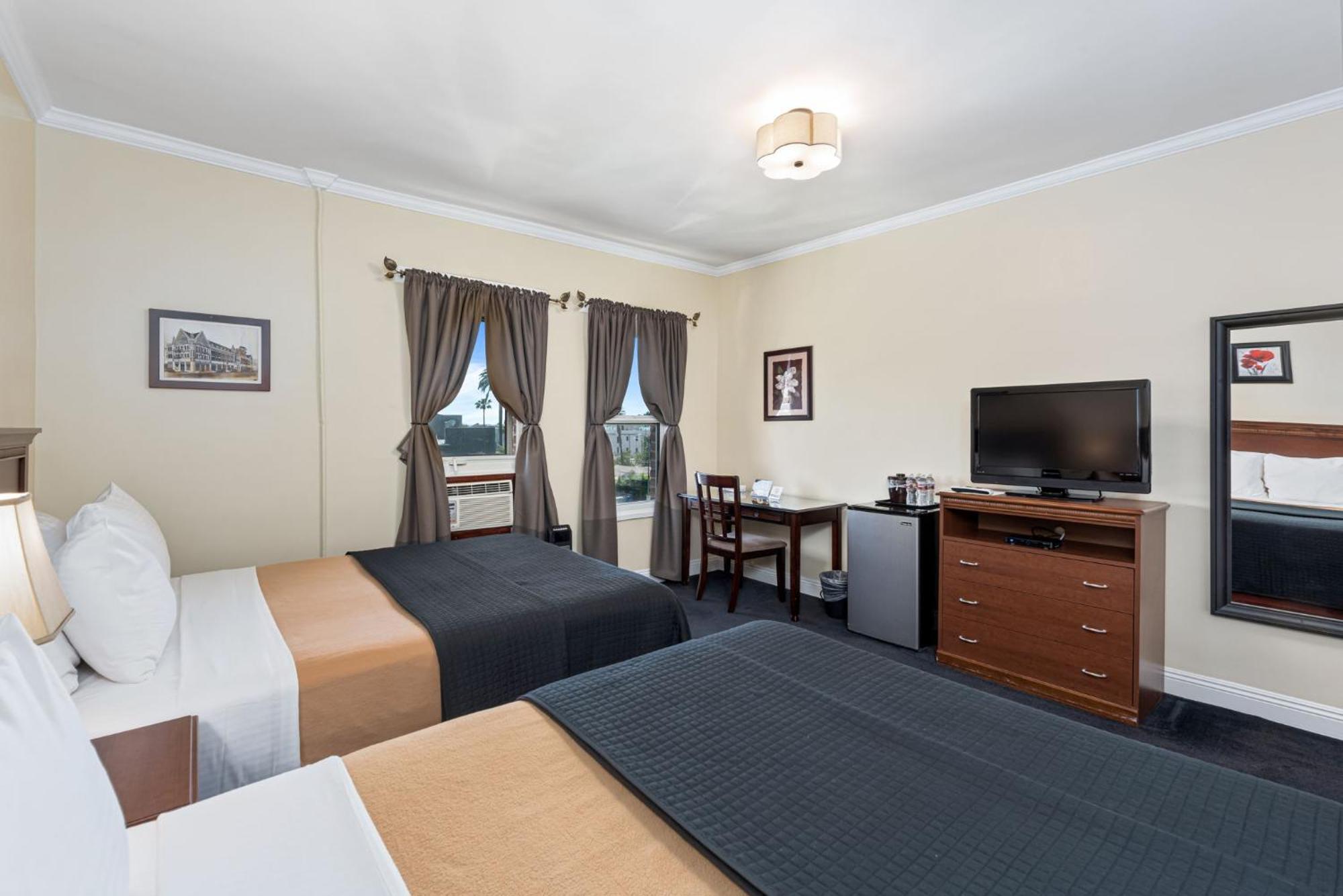 Kamer met 2 Queensize Bedden