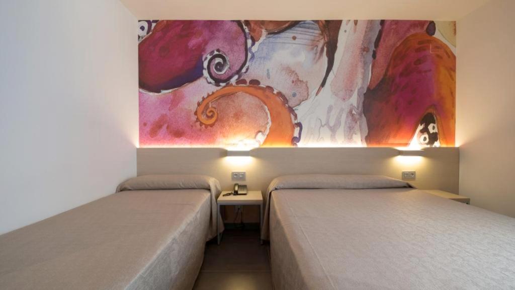 Chambre Triple - Vue sur la Piscine