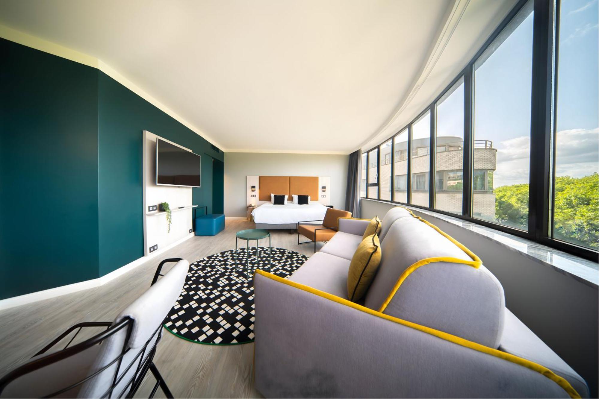 Suite Junior con cama doble grande y sofá cama