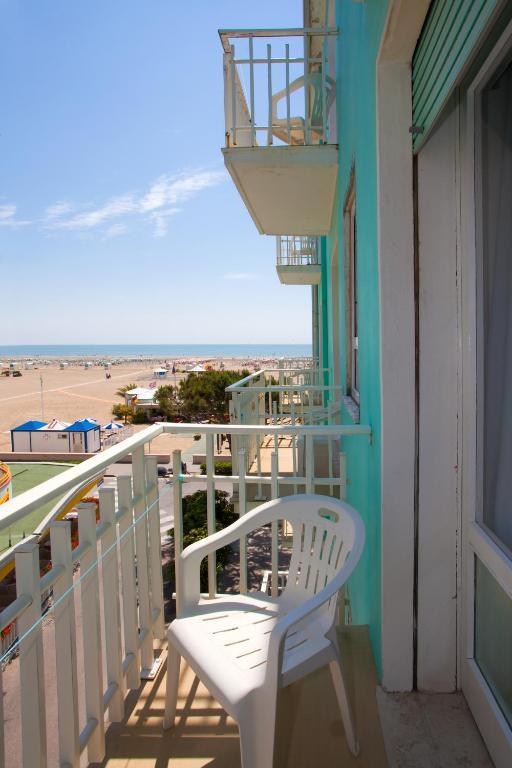 Double or Twin Room with Balcony and Partial Sea View,1765319351:JPEG