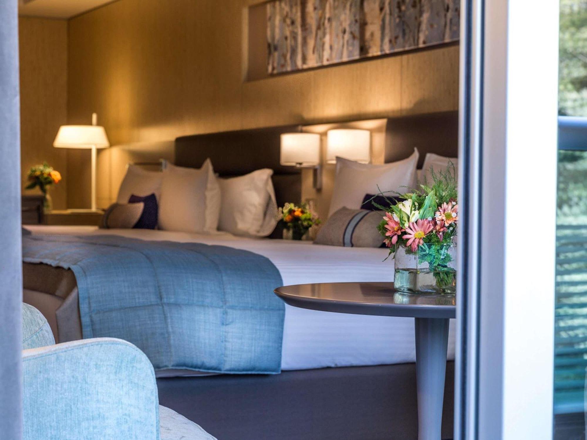 Suite Deluxe avec 2 Lits Doubles et Balcon - Vue sur Parc