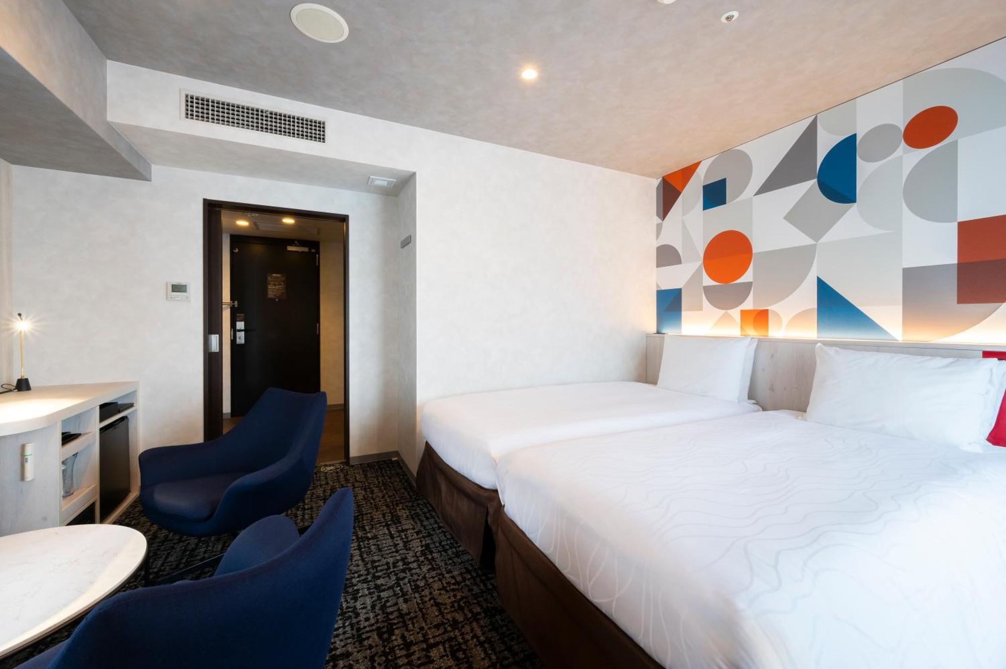 Quarto Superior com 2 Camas de Solteiro e Cama Extra - Não Fumantes