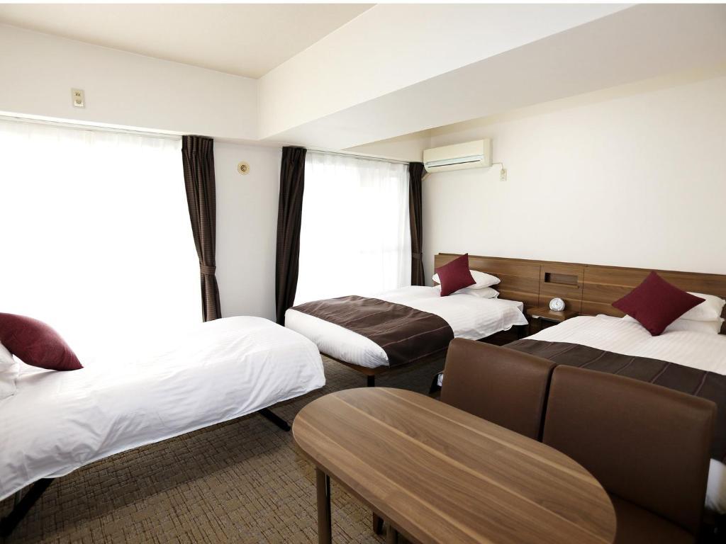 Deluxe Triple Room Non-Smoking House Keeping is Optional Additional Cost,702089980:JPEG
