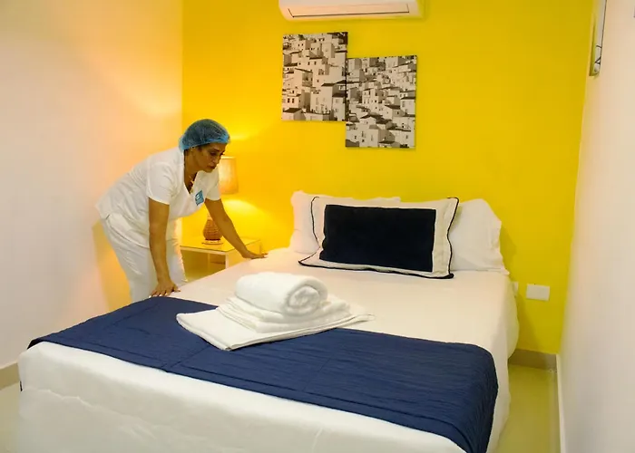 Malecon Premium Rooms & Hotel