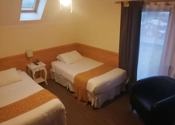 Dein Haus Hotel y Departamentos